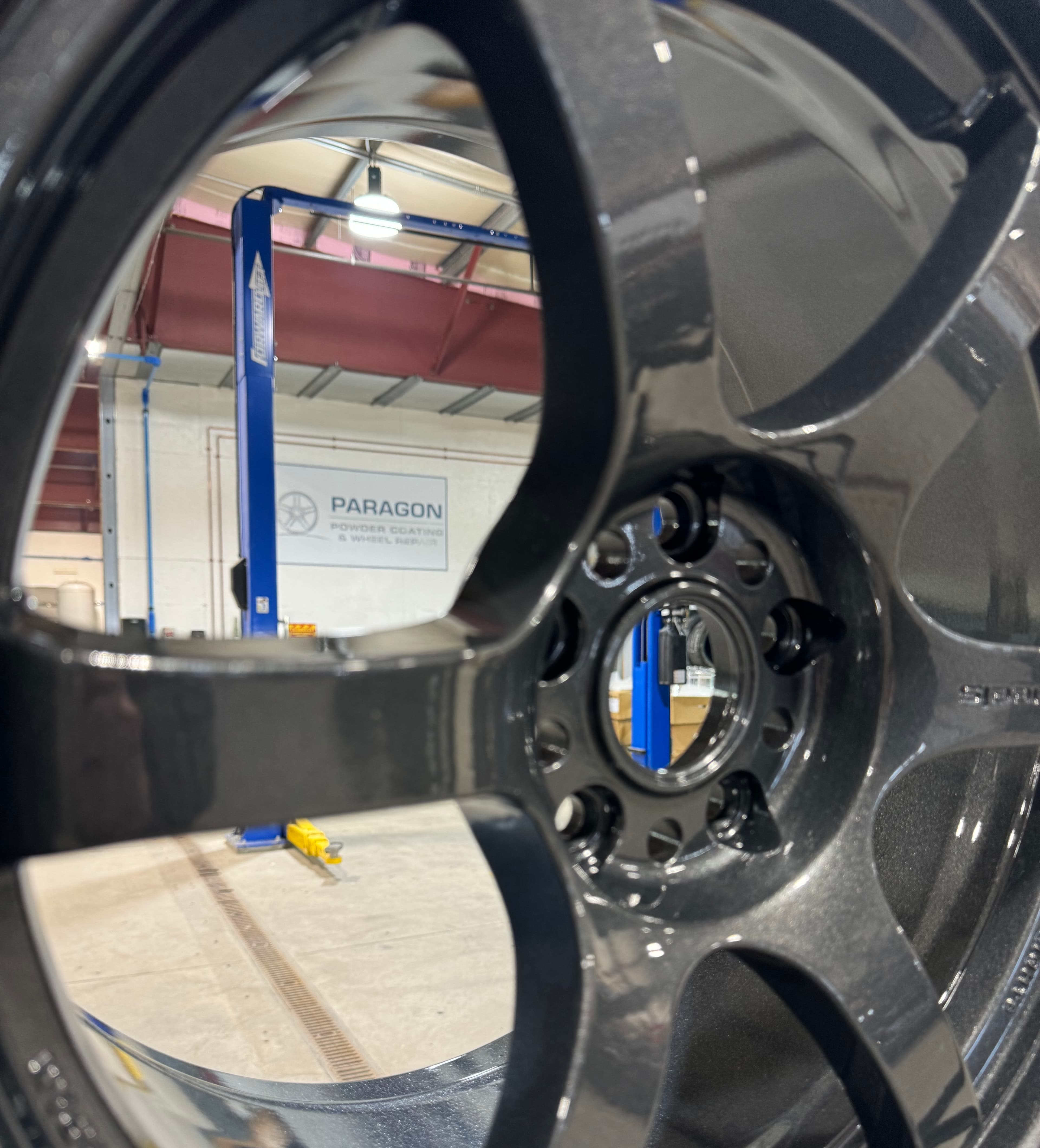 Paragon Powder Coating & Wheel Repair sign